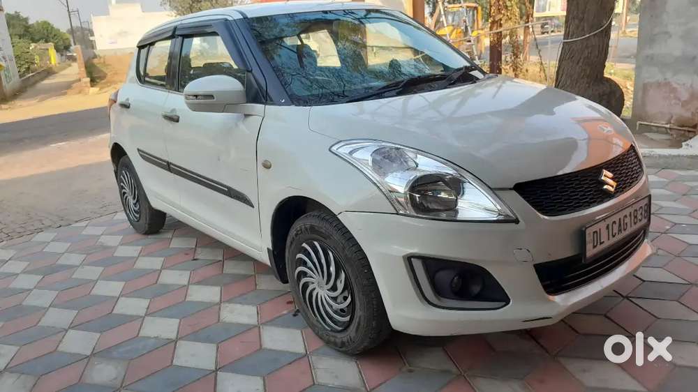 Maruti Suzuki Swift Lxi 2016