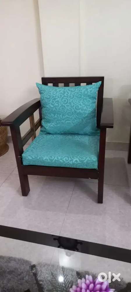 5-Seater Wooden Sofa along with cushions.Good Condition