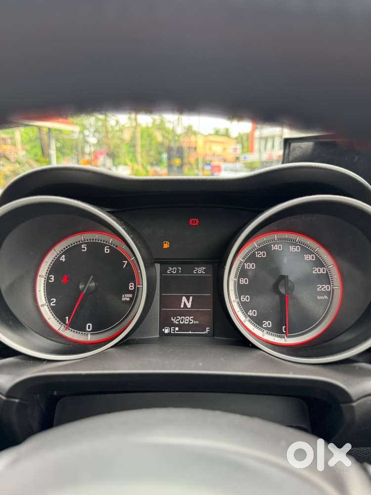 Swift 1.2 Vxi 2021 Km Driven