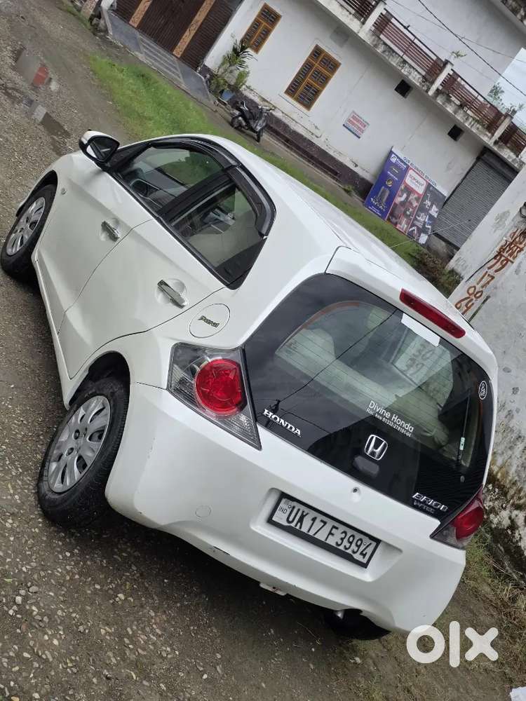 Honda Brio Smt
1st Owner 
Central Locking