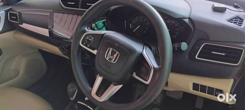 Honda Amaze Golden Brown Automatic Car, First Owner  In Good Condition