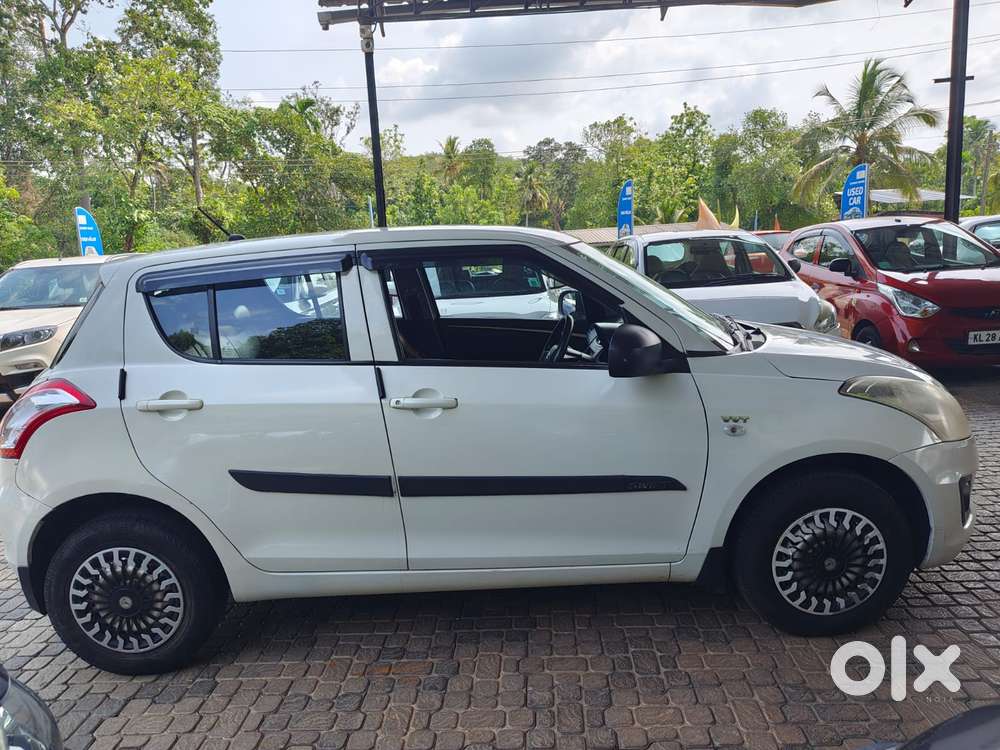 Maruti Suzuki Swift Lxi Optional-o, 2017, Petrol