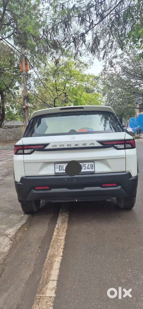 Maruti Suzuki Brezza 1.5 Lxi Smart Hybrid, 2023, Petrol