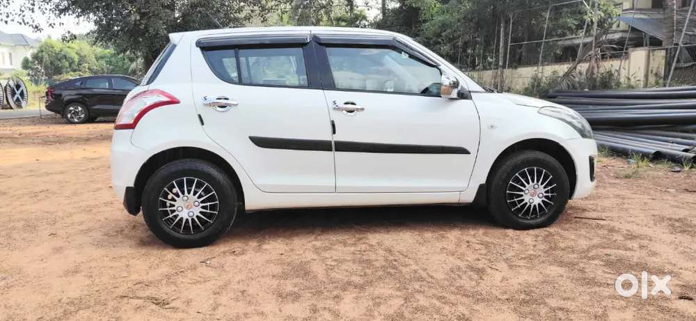 Maruti Suzuki Swift 2016 Lxi Optionel