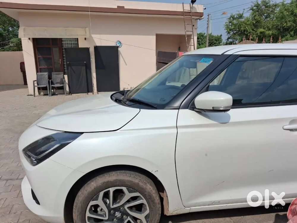Maruti Suzuki Swift Vxi O 2025