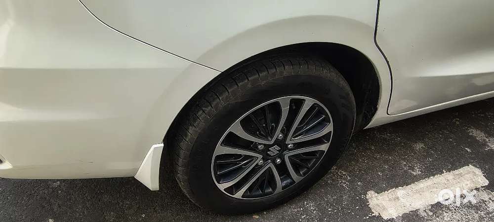 Ertiga Zxi (0) Cng Top Model