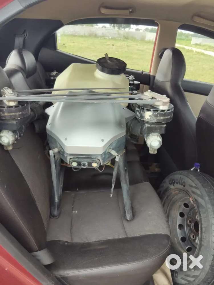 Agriculture Drone And Eon Car Petrol And Lpg