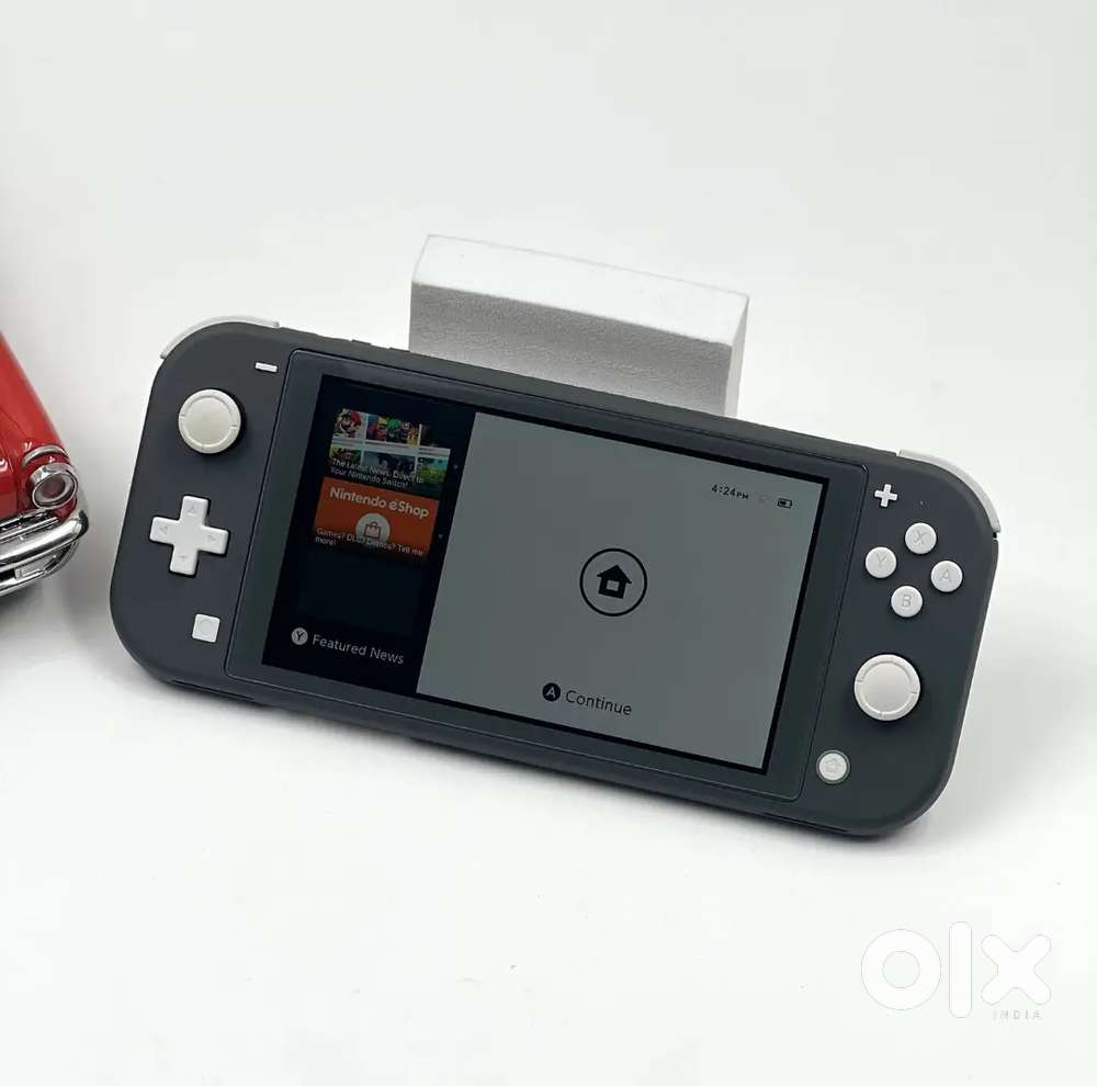 NINTENDO SWITCH LITE (GREY) WITH 24 INBUILT GAMES AND GOOD