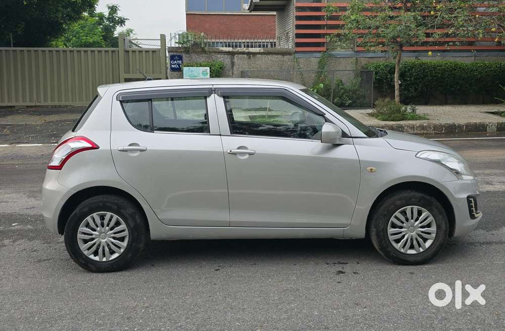Maruti Suzuki Swift Lxi Optional-o, 2015, Petrol