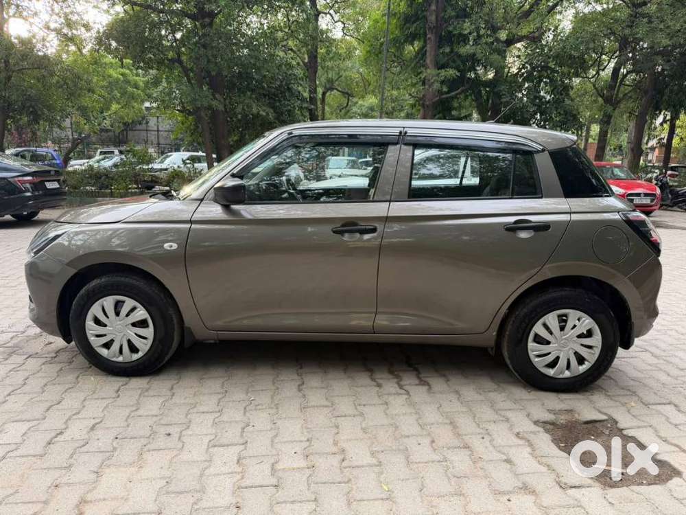 Maruti Suzuki Swift 1.2 Lxi (o), 2024, Petrol