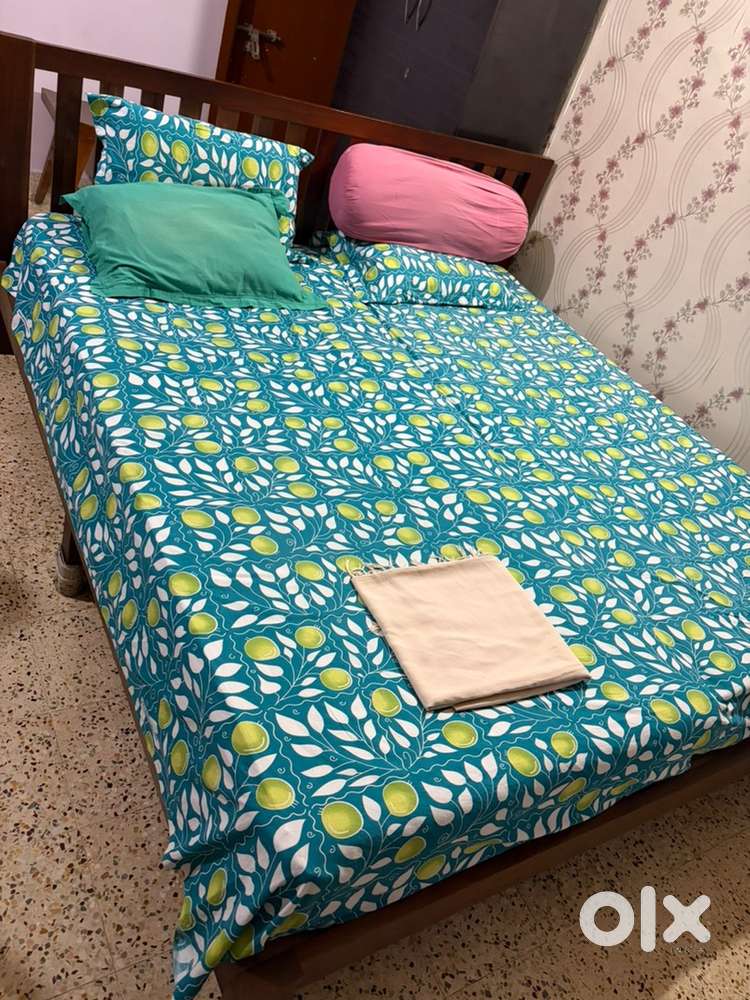Wooden King size bed (Teak Finish) with mattress for sale