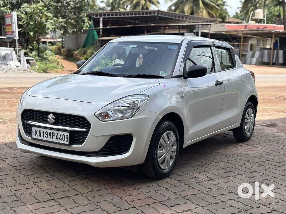 Maruti Suzuki Swift 1.2 Lxi (o), 2024, Petrol