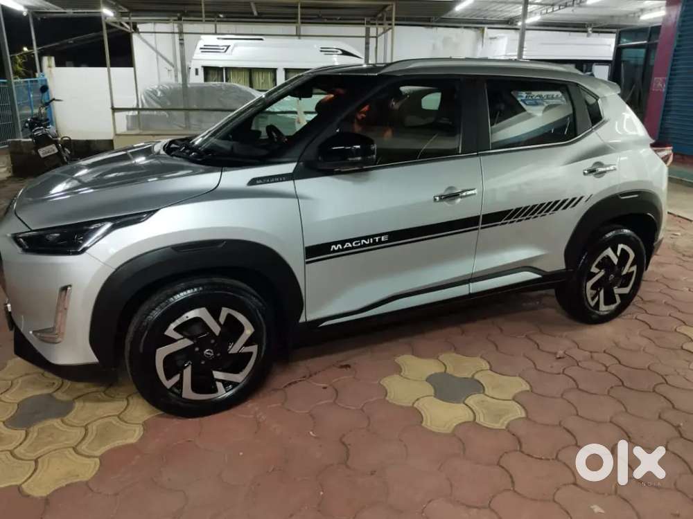 Lady Used Nissan Magnite 2023 Petrol 25000 Km Driven