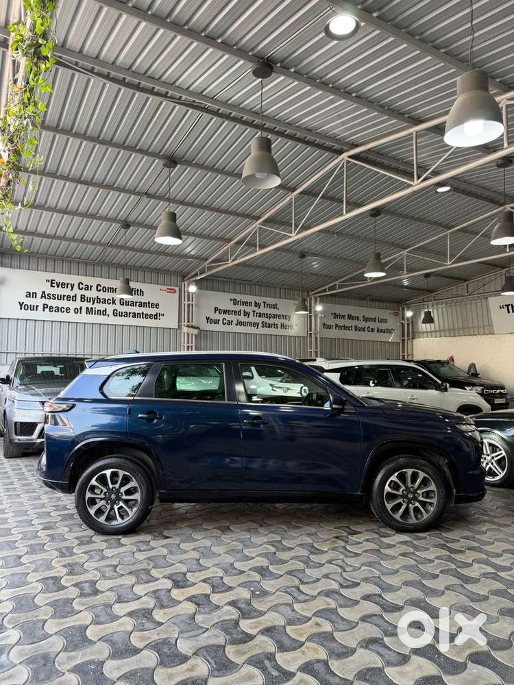 Maruti Suzuki Grand Vitara 1.5 Zeta Plus Dual Tone Intelligent Hybri..