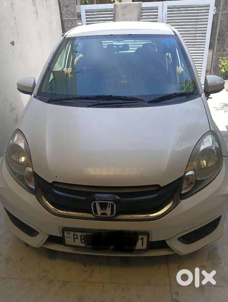 White Petrol Car For Sale – Low Running, Excellent Condition