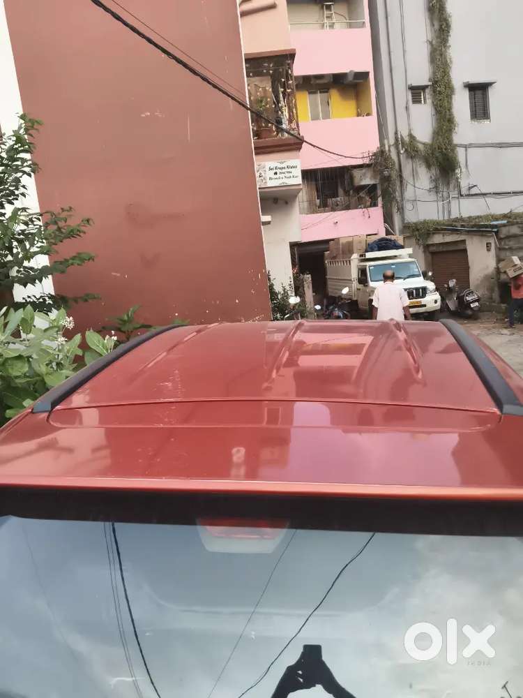 Well-maintained 2018 Mahindra Kuv100 K2 (red)