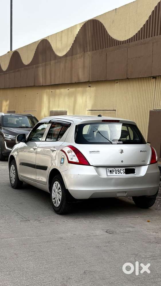 Maruti Suzuki Swift Lxi Optional-o, 2015, Petrol