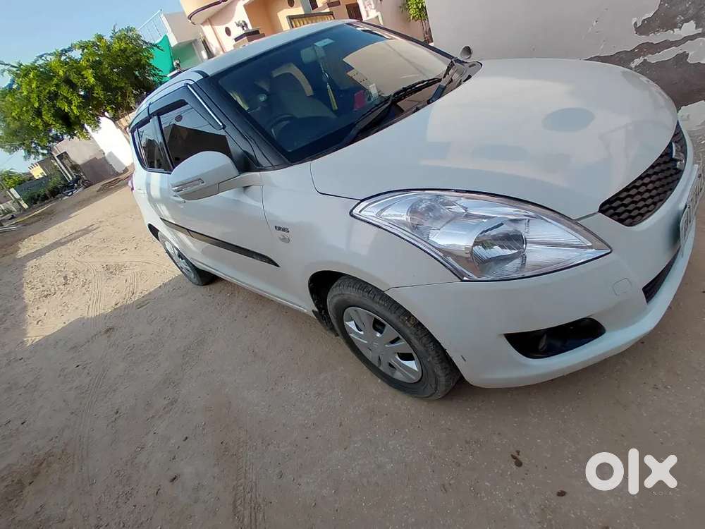 Maruti Suzuki Swift Lxi 2014