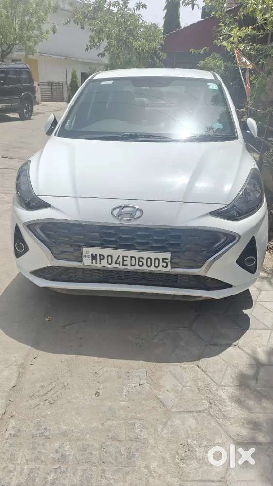 Hyundai Aura 2022 Petrol 41000 Km  Services Centre ,armrest,sunshades
