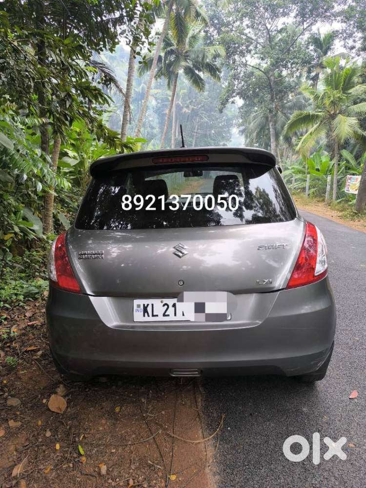 Maruti Suzuki Swift Lxi Optional-o, 2015, Petrol