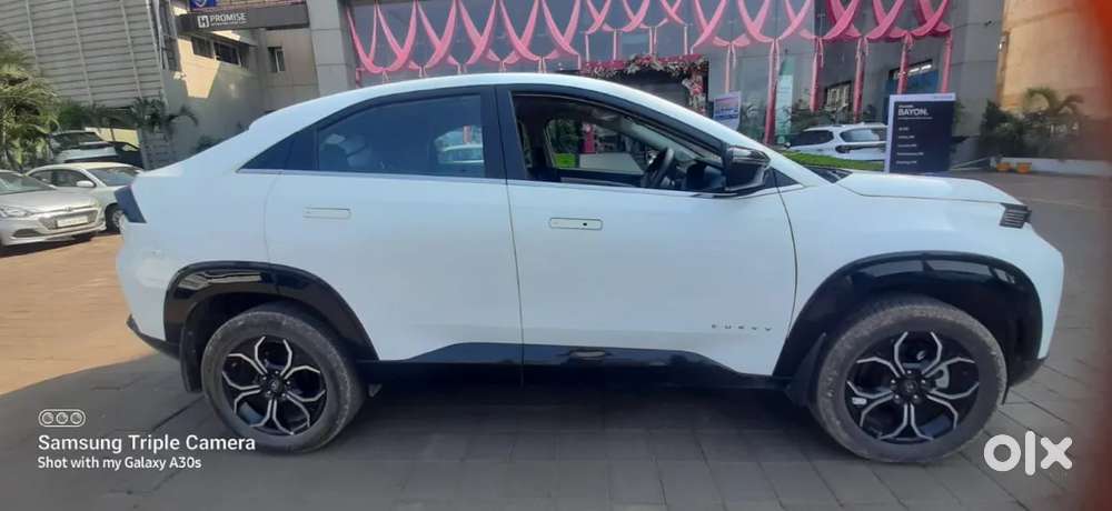 Tata Curvv Creative 1.2 Revotron Petrol 6mt, 2025, Petrol