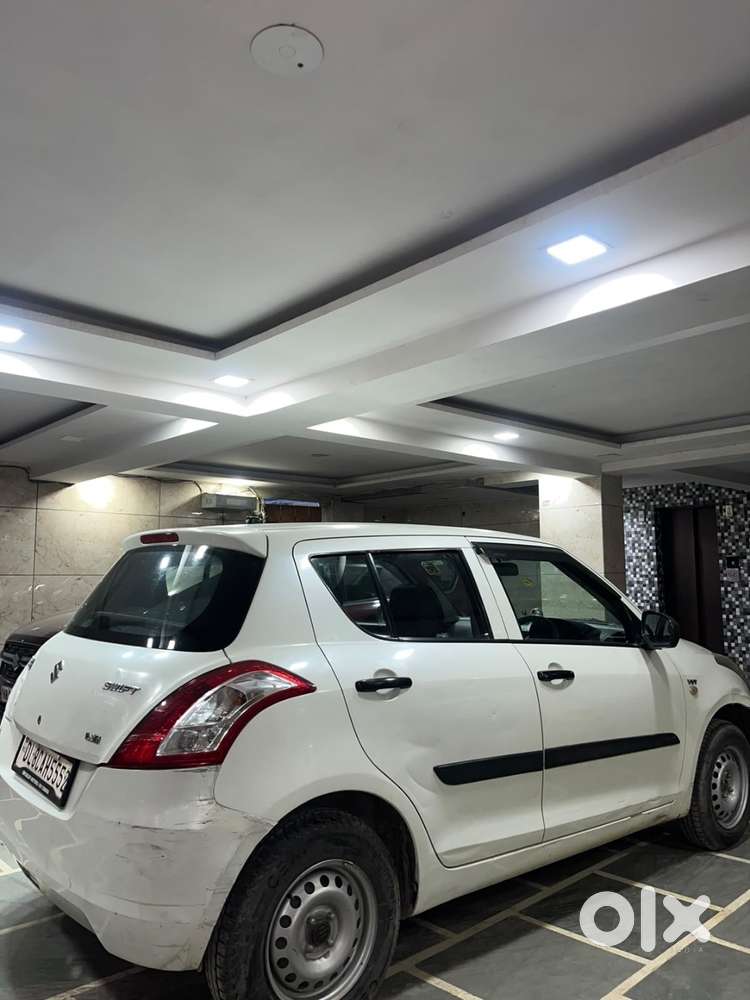 Maruti Suzuki Swift Lxi 2015