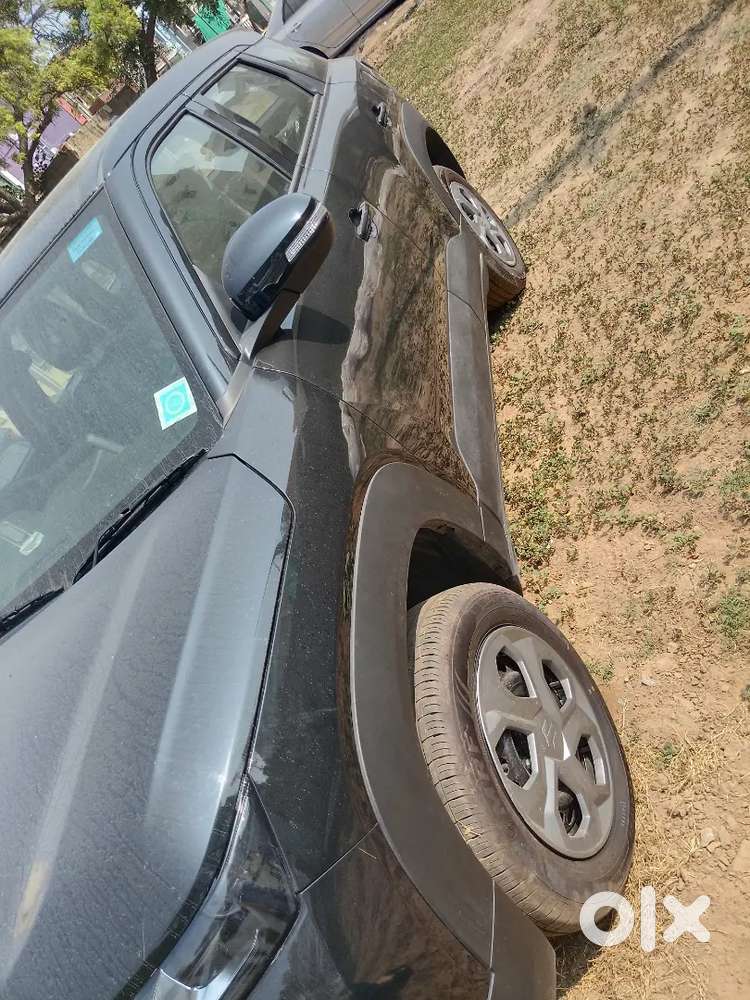 Maruti Suzuki Brezza Vxi 2026