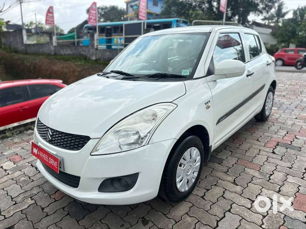 Maruti Suzuki Swift Lxi Optional-o, 2013