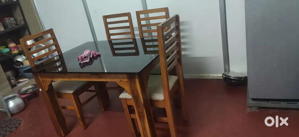 Wooden dining table glass top