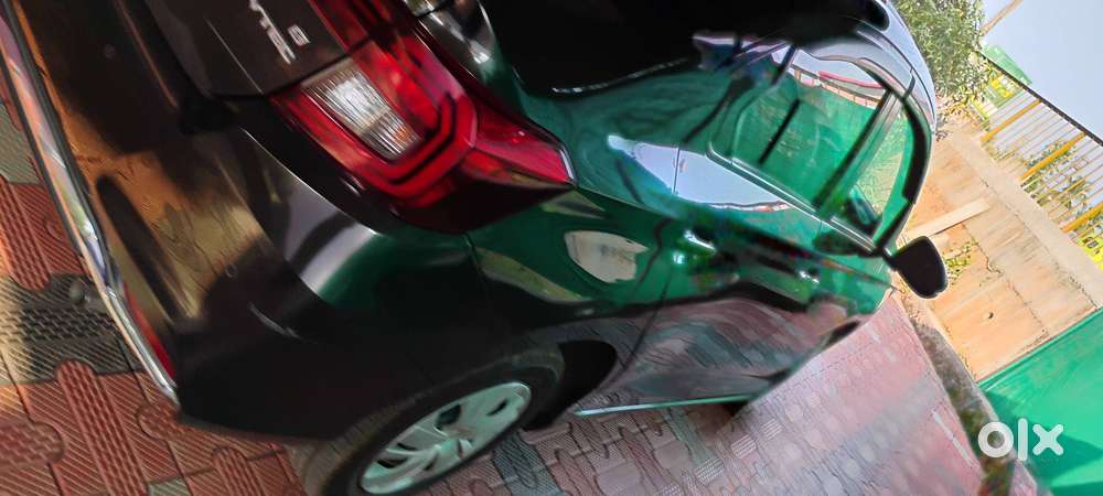 Honda Amaze Golden Brown Automatic Car, First Owner  In Good Condition