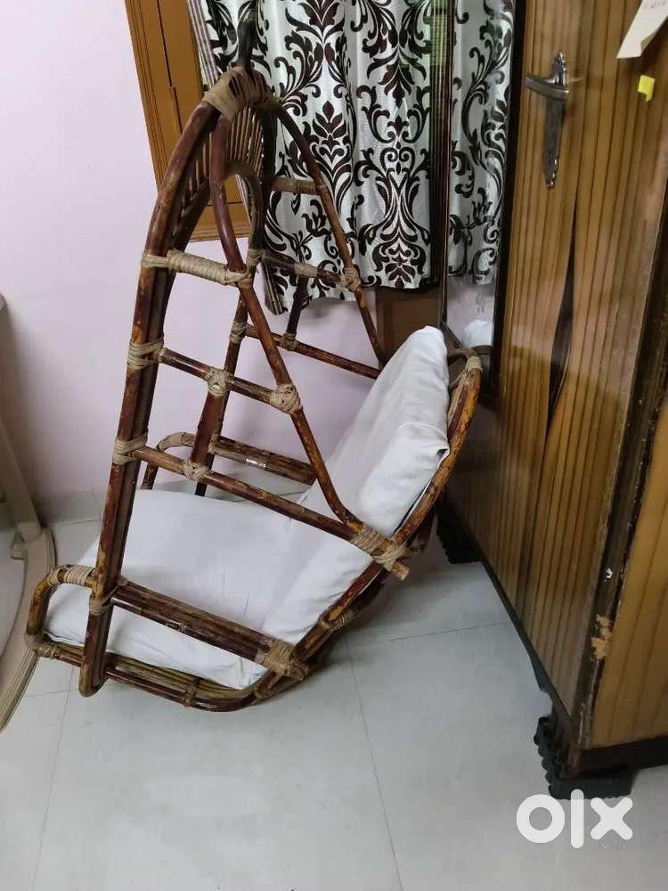 Wood swing with cushion and chain