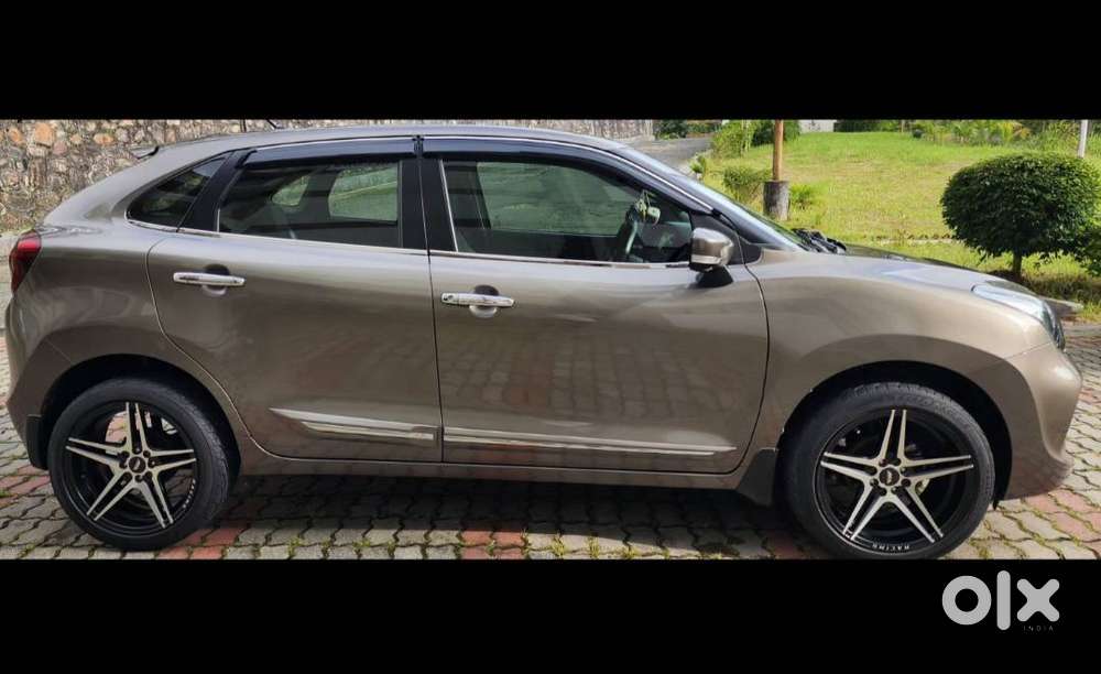 Baleno Showroom Condition Only 20000 Km Running Fully Loaded.