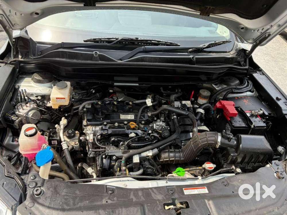 Maruti Suzuki Grand Vitara 1.5 Zeta Plus Dual Tone Intelligent Hybri..