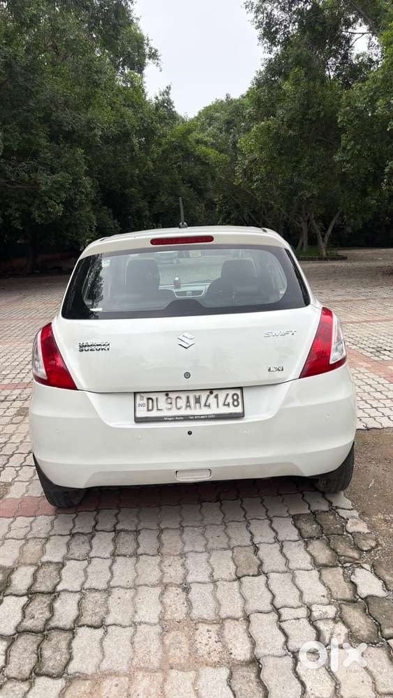 Maruti Suzuki Swift Lxi Optional-o, 2017, Cng & Hybrids