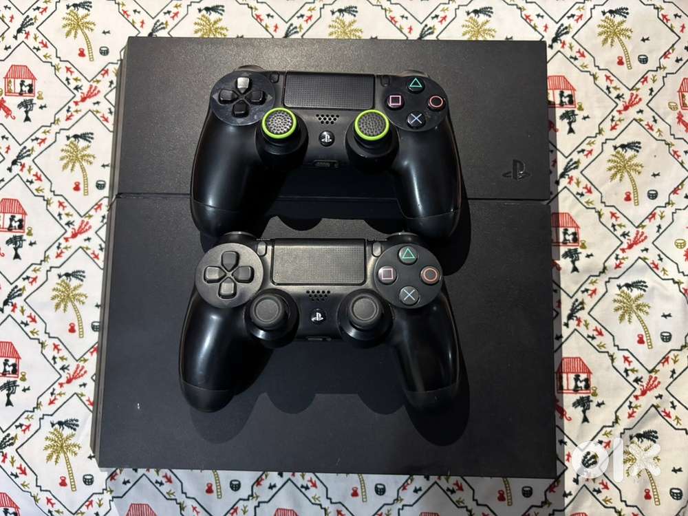 PlayStation 4 (PS4) for Sale - Excellent Condition with 2 Controllers!