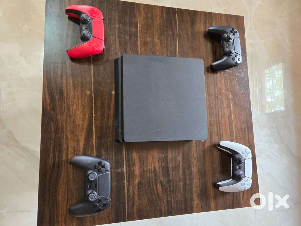 Sony PS4 Slim Console with 4 Controllers (Mint Condition)