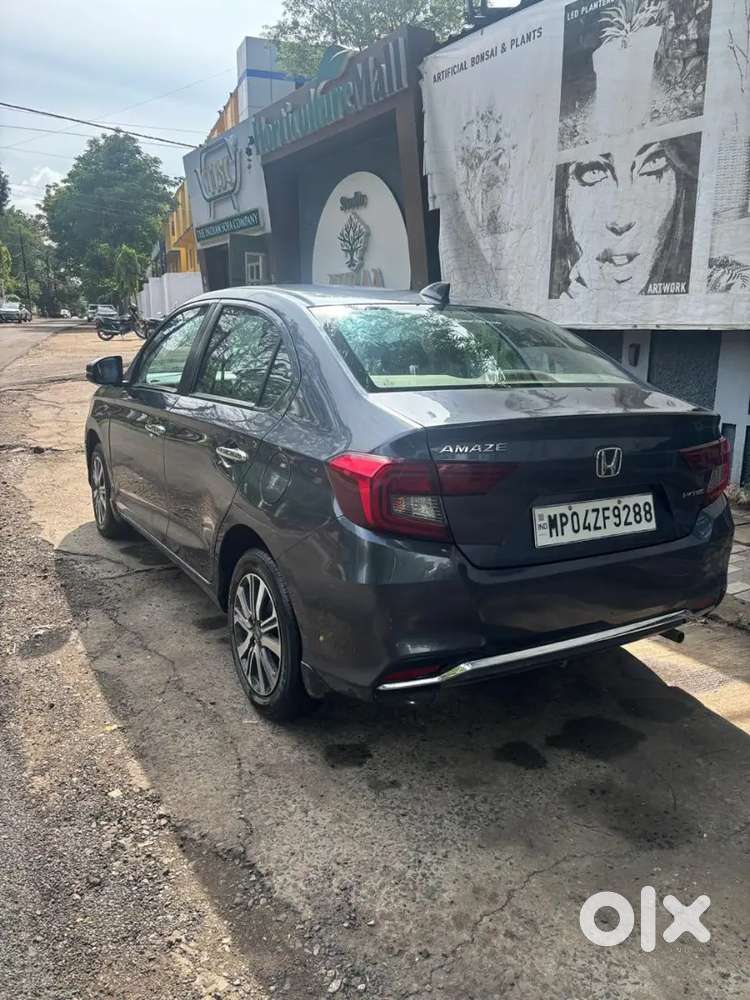Grey Colour Honda Amaze Good Maintain New Condition