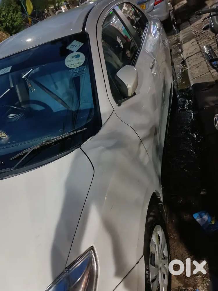 Maruti Suzuki Dzire 2024 Variant 1.2 Vxi Cng