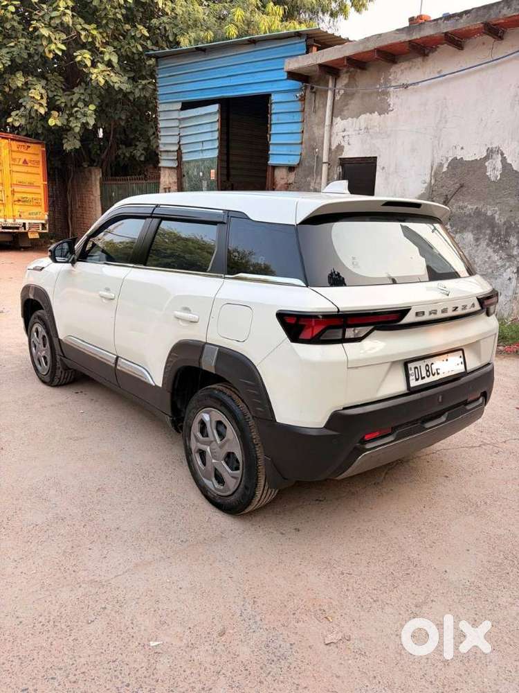Maruti Suzuki Brezza 1.5 Lxi Smart Hybrid, 2024, Petrol