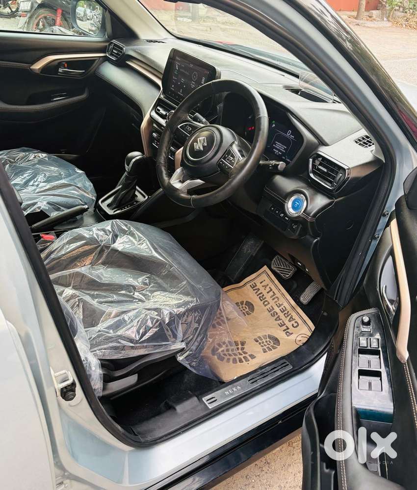 Maruti Suzuki Grand Vitara 1.5 Zeta Plus Dual Tone Intelligent Hybri..