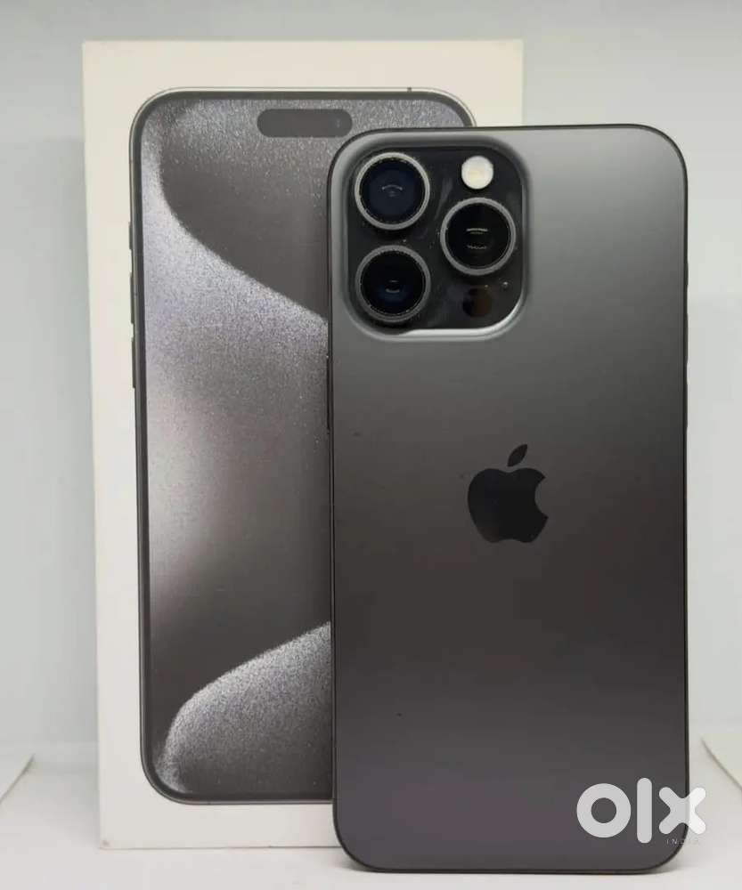 Iphone 15 pro in black titanium colour under warranty card with bill