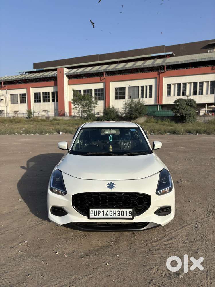 Maruti Suzuki Swift 1.2 Lxi (o), 2024, Petrol