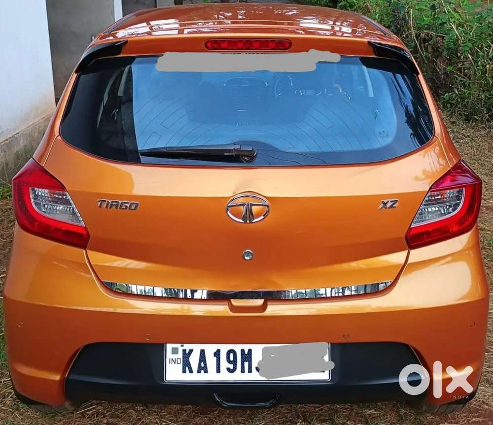 Tata Tiago Xz Manual Transmission Sunburst Orange Colour, 2018 Petrol