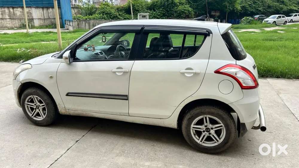 Maruti Suzuki Swift Lxi 2016
