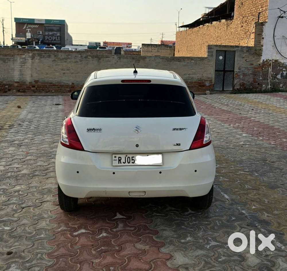 Maruti Suzuki Swift Lxi Optional-o, 2015, Petrol