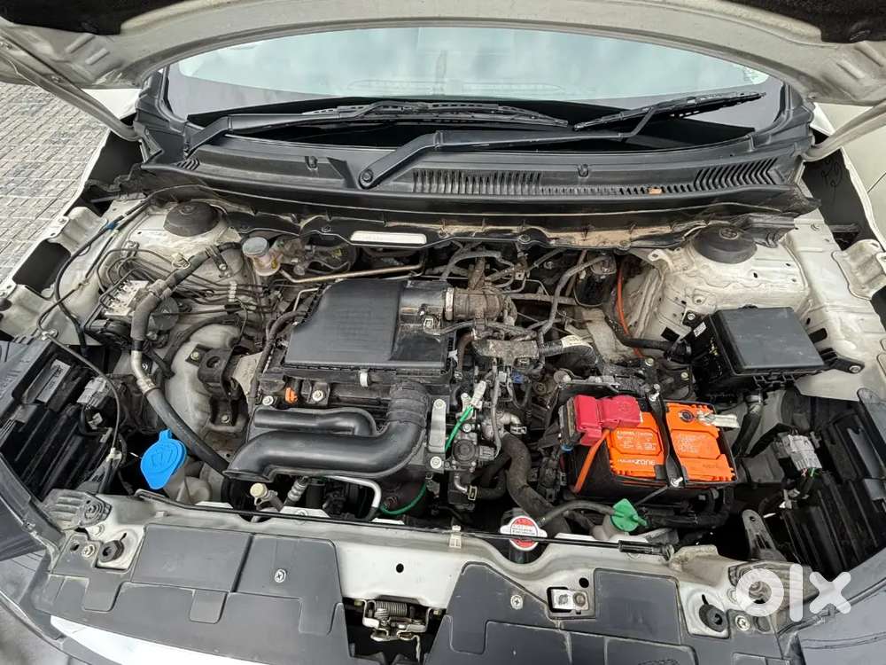 Maruti Suzuki Brezza Lxi 2024