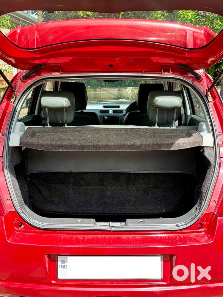 Bright Red Maruti Suzuki Lxi