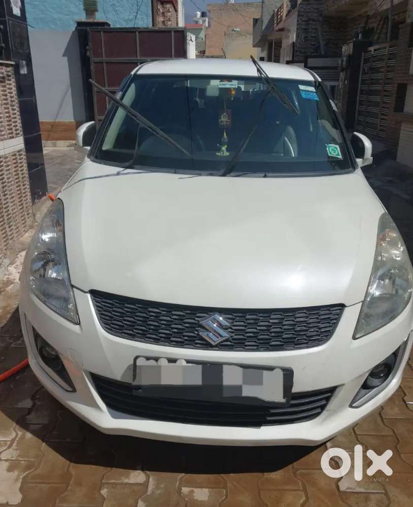 Maruti Suzuki Swift 2016 Pearl White Colour