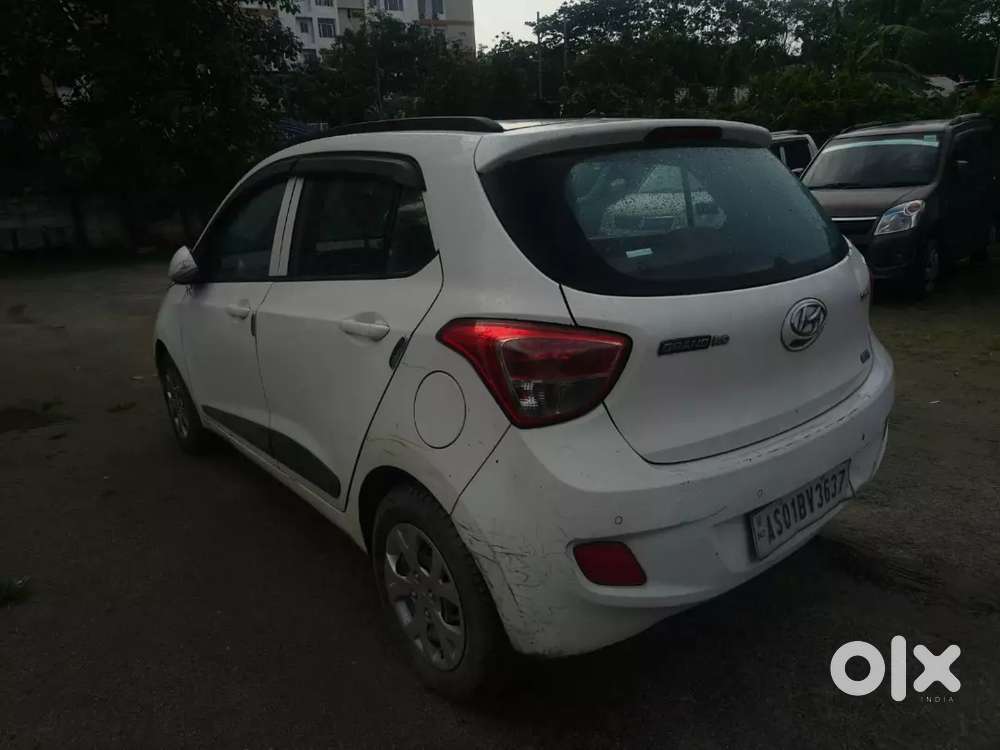 Hyundai Grand I10 Prime 2015 White Colour Petrol 90000 Km Driven