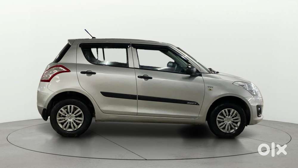 Maruti Suzuki Swift 1.2 Lxi (o), 2015, Petrol